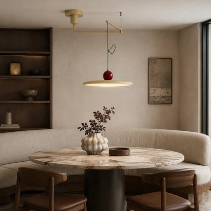 Pendant light with a shade and counterweight