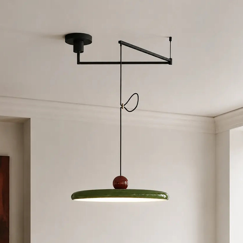 Pendant light with a shade and counterweight