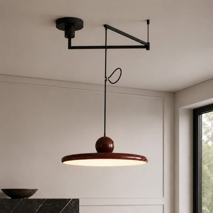 Pendant light with a shade and counterweight