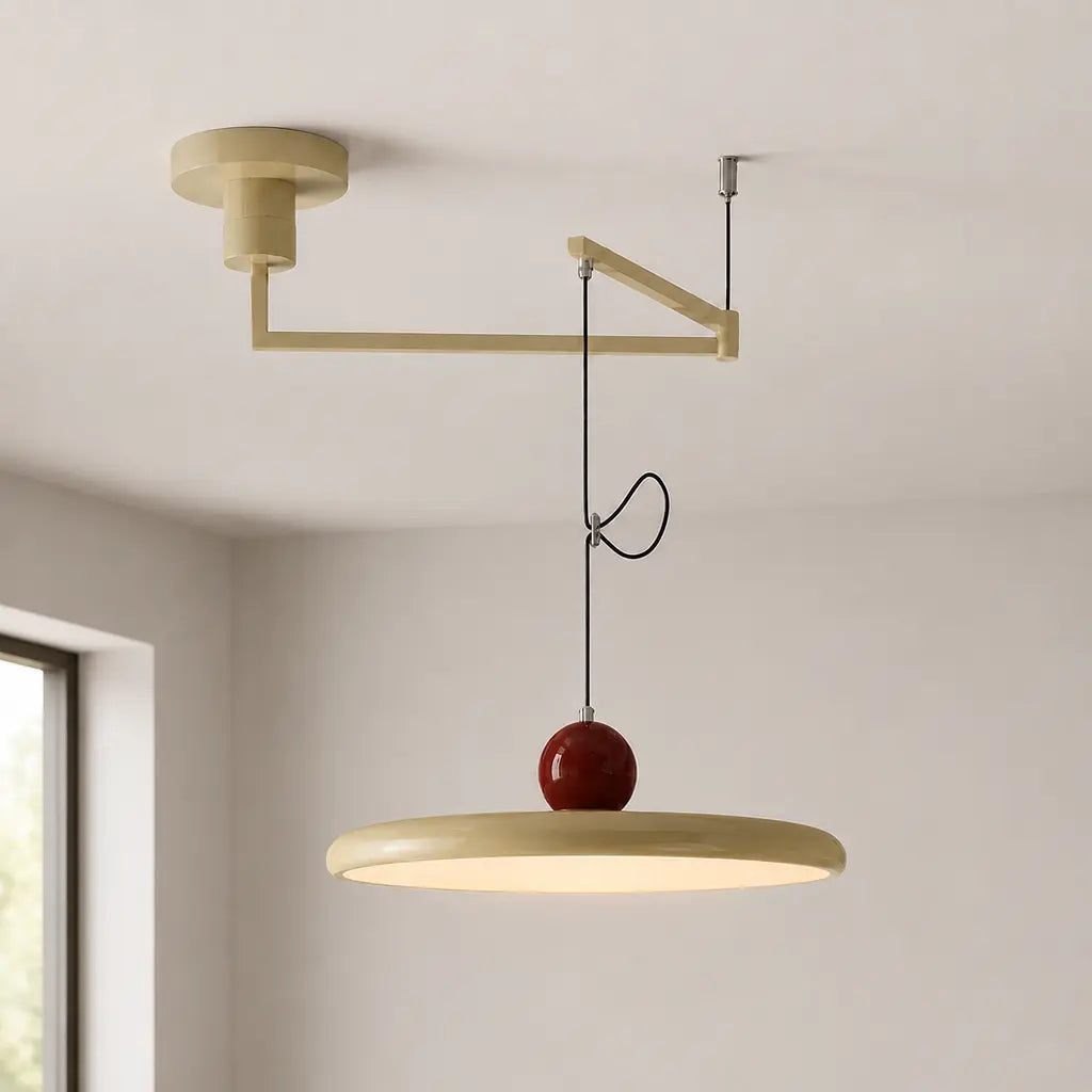 Pendant light with a shade and counterweight