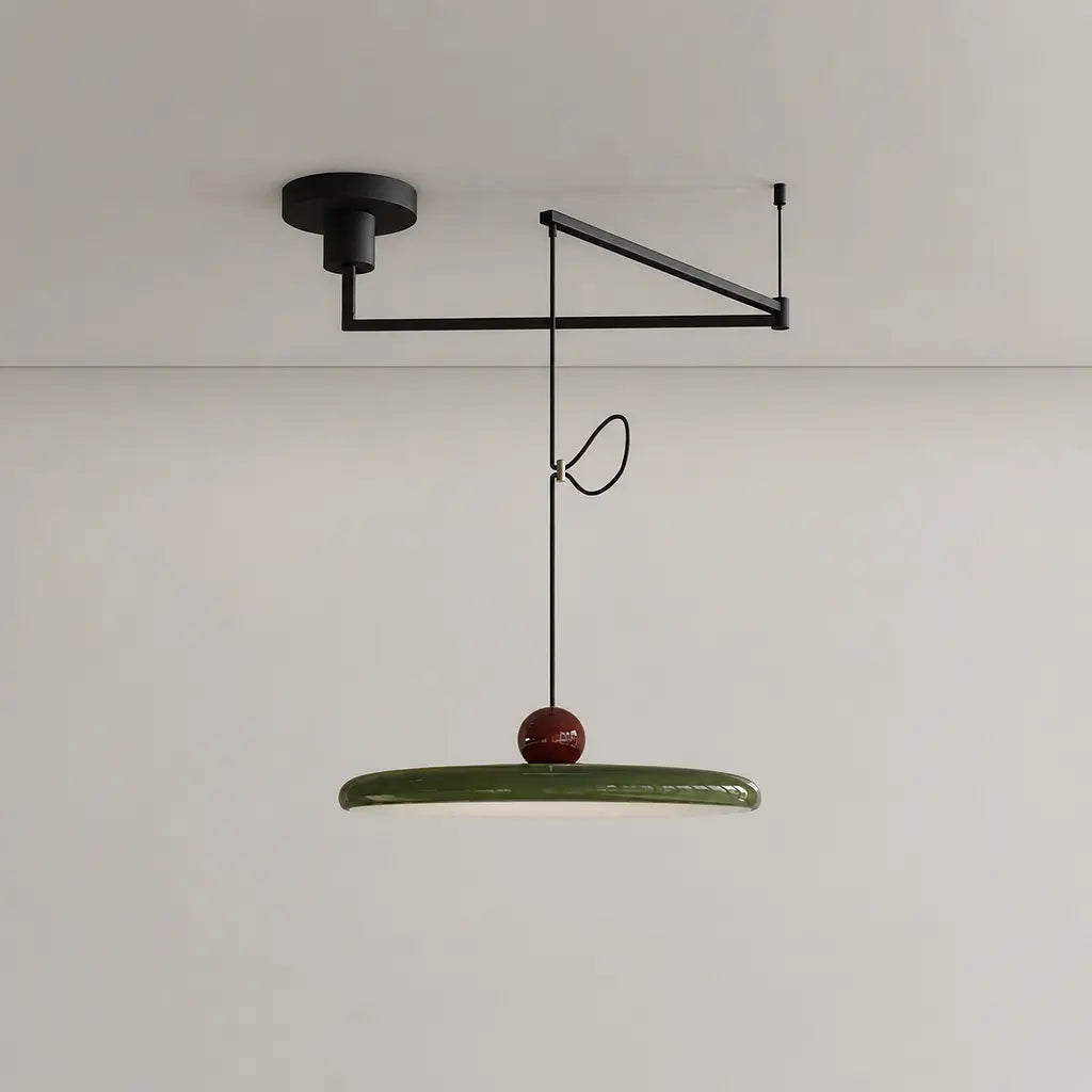 Pendant light with a shade and counterweight