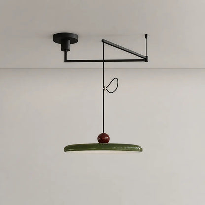 Pendant light with a shade and counterweight
