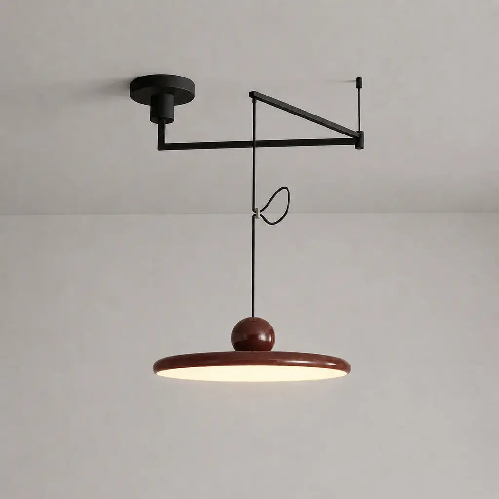Pendant light with a shade and counterweight