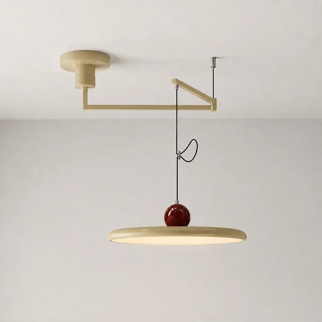 Pendant light with a shade and counterweight