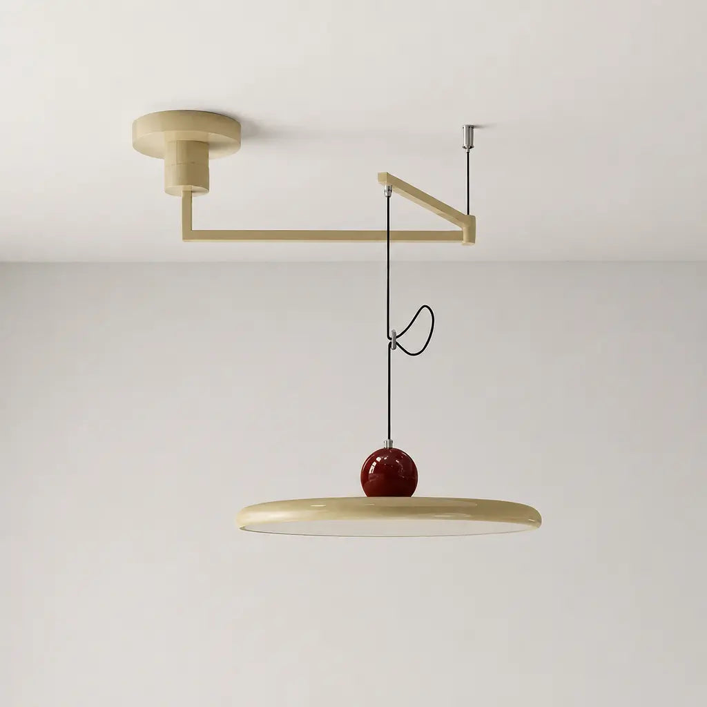 Pendant light with a shade and counterweight