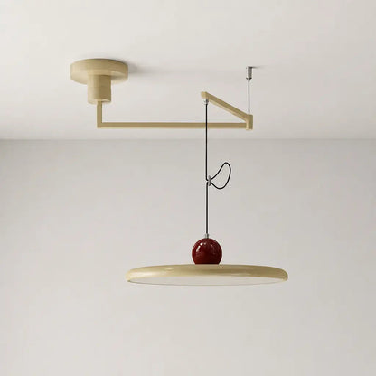 Pendant light with a shade and counterweight