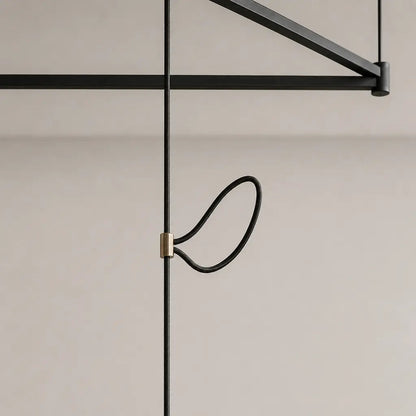 Pendant light with a shade and counterweight