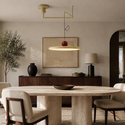 Pendant light with a shade and counterweight