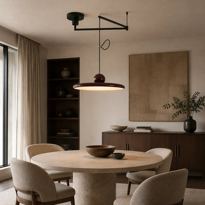 Pendant light with a shade and counterweight