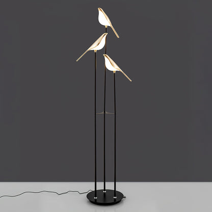 Floor lamp with a bird motif
