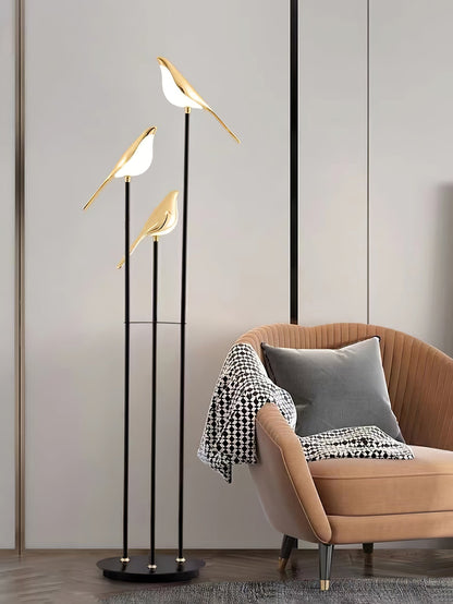 Floor lamp with a bird motif