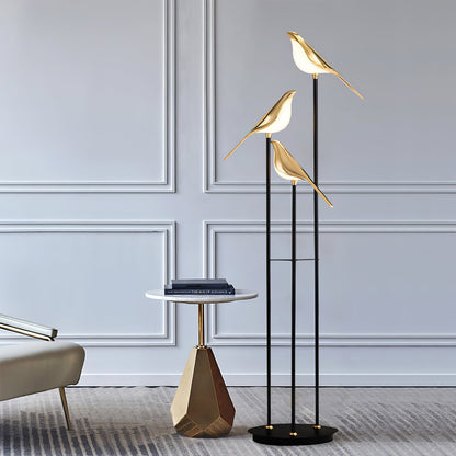 Floor lamp with a bird motif