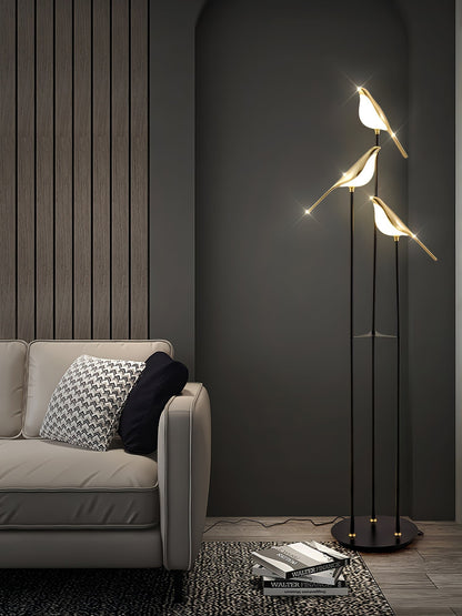 Floor lamp with a bird motif
