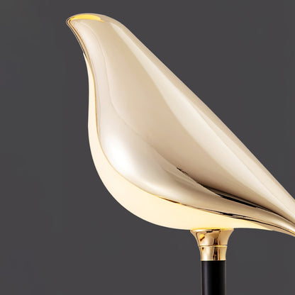 Floor lamp with a bird motif