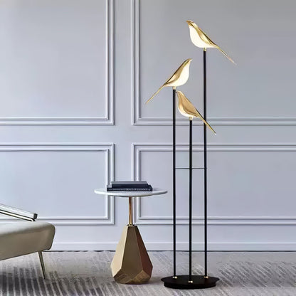 Floor lamp with a bird motif