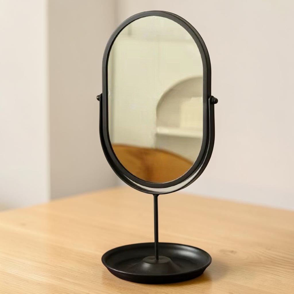 Rotating freestanding makeup mirror