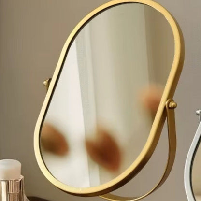 Rotating freestanding makeup mirror