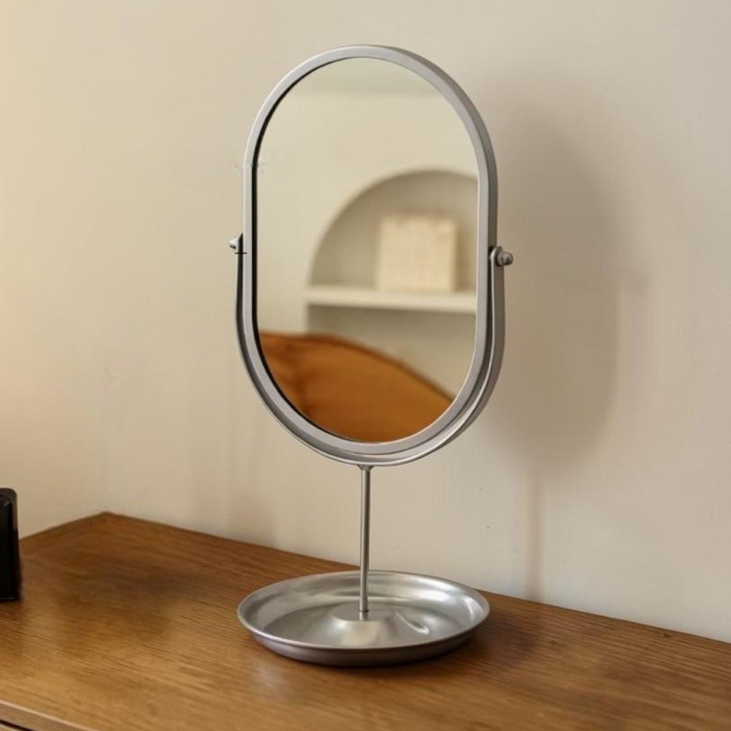 Rotating freestanding makeup mirror