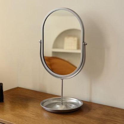 Rotating freestanding makeup mirror