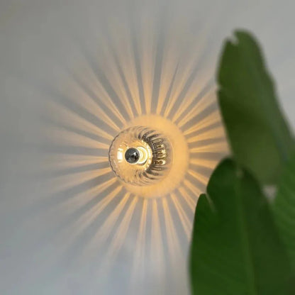 Applique en verre avec boîtier métallique