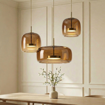 Glass pendant lamp with a shade