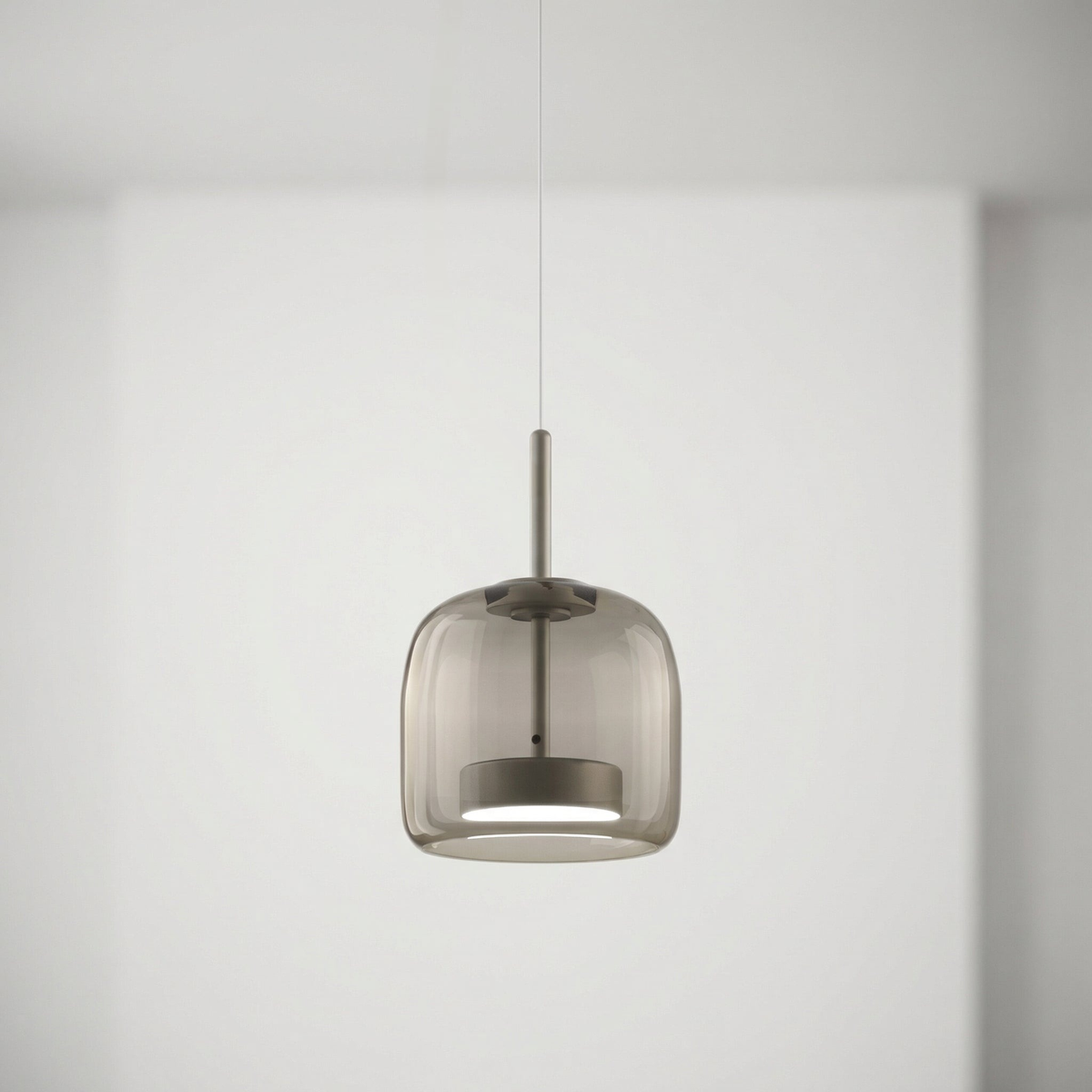 Glass pendant lamp with a shade