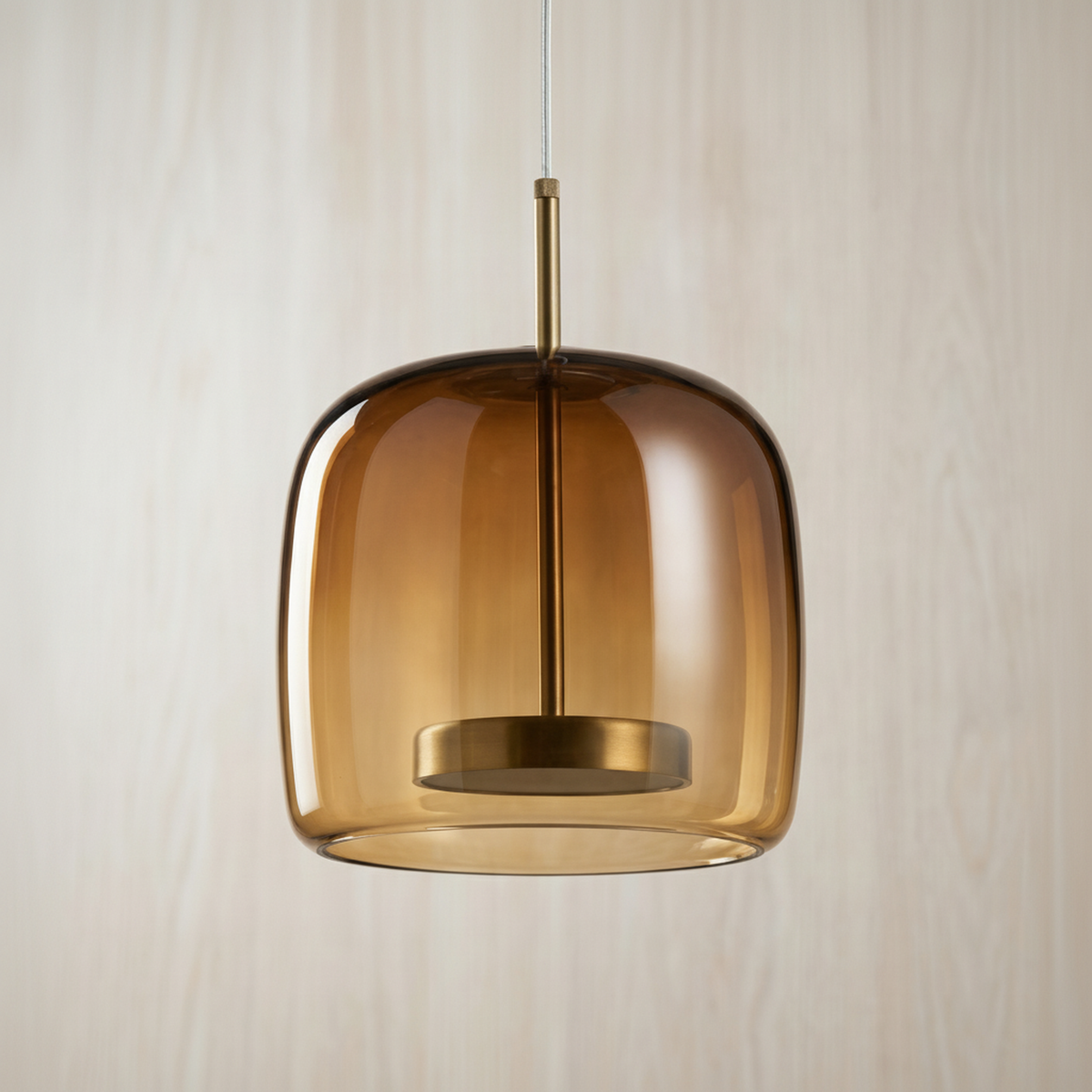 Glass pendant lamp with a shade