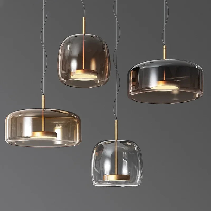 Glass pendant lamp with a shade